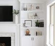 White Fireplace with Shelves Unique White Built Ins Around the Fireplace before and after