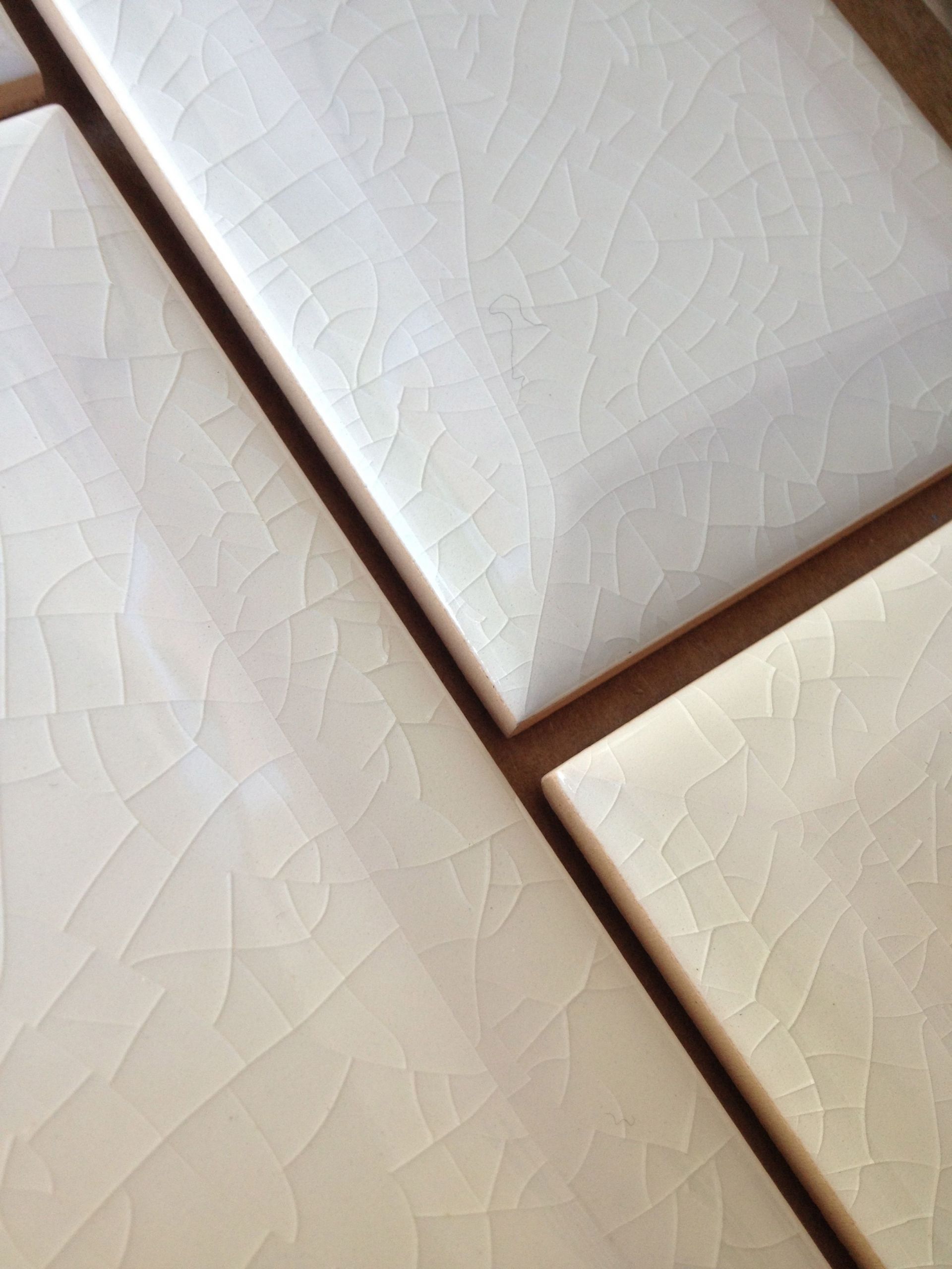 Subway tile for the backsplash has a delicate crackle finish 860deb8509af59cf b1d11c5dd32
