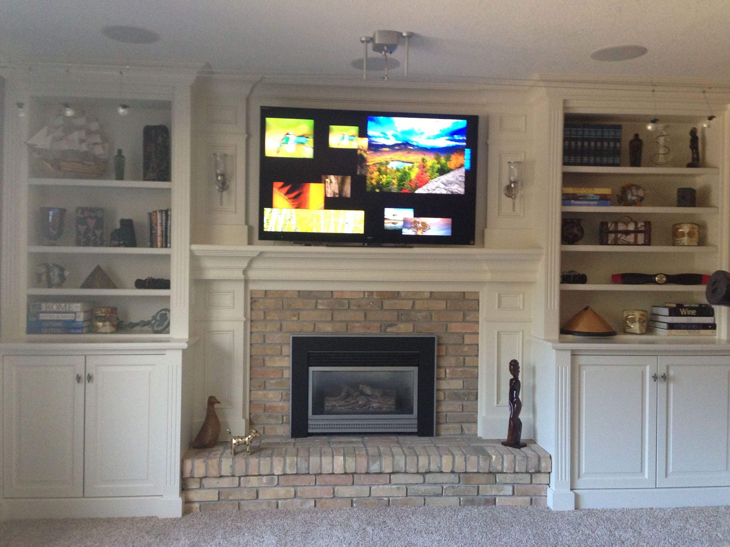Fireplace with shelving unites on each side 16a58b485d e458b1528cfdb65a