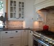 White Kitchen Brick Backsplash Elegant Backsplash with White Cabinets and Black Countertops