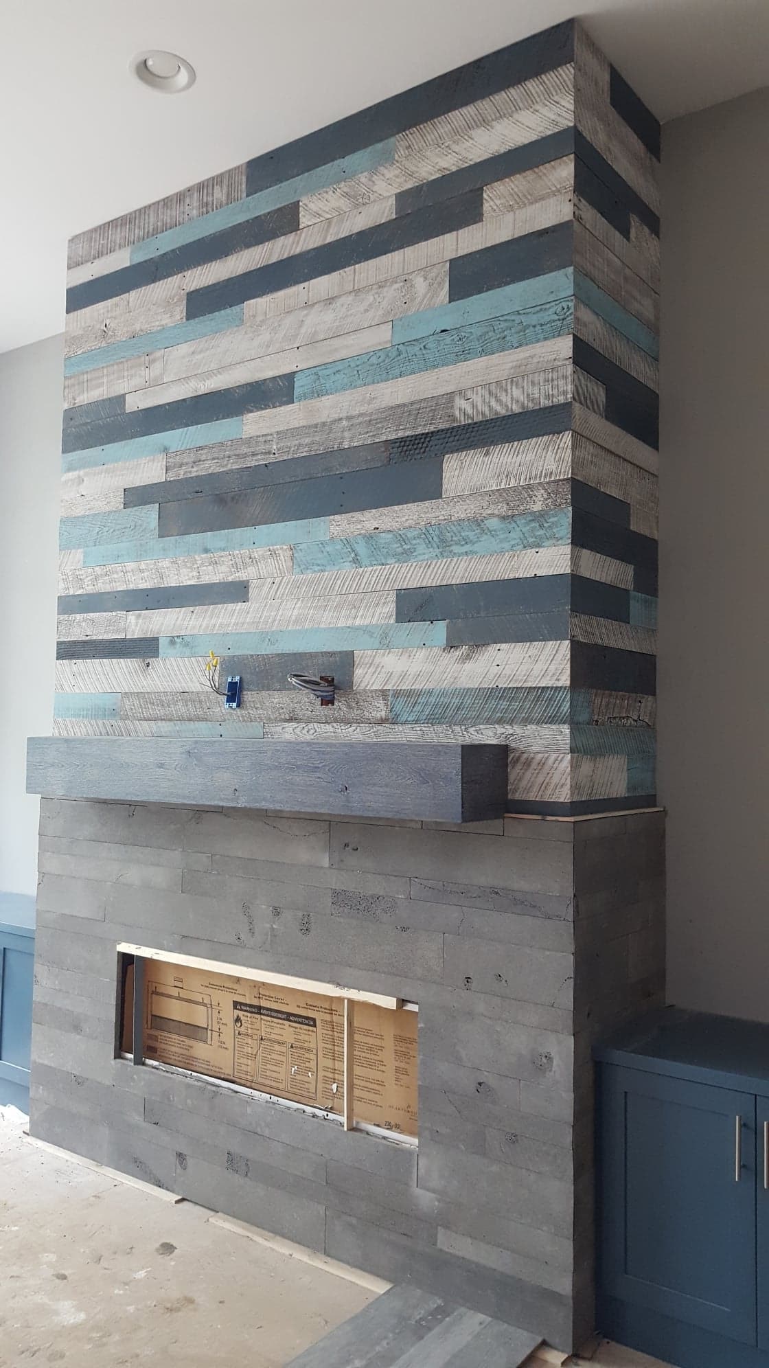 Mixed Planc Lavastone and Barnwood Fireplace mixed medium stone and wood fireplace