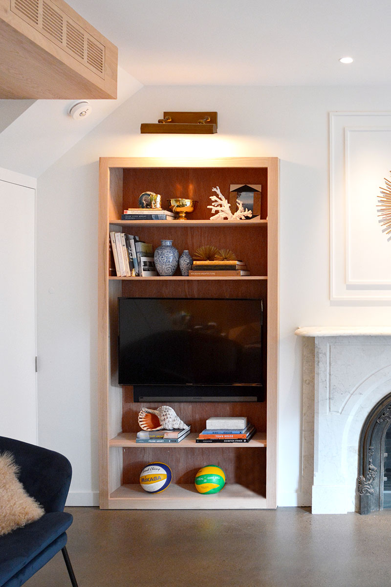 built in wood bookshelves around fireplace 158 03