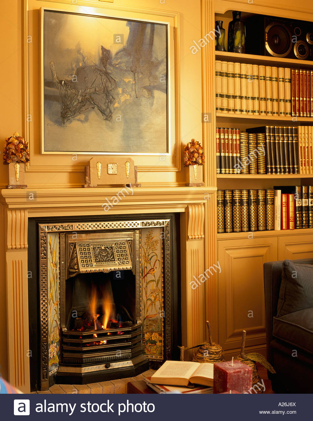 Fireplace Bookshelf Lovely View Of A Lit Fireplace Beside A Bookshelf Stock