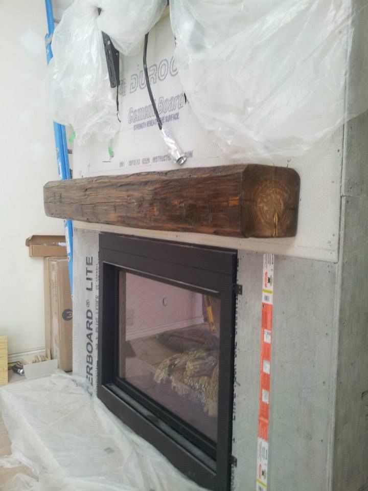 Installing a barn beam mantel BEFORE the stone is the best 3a51c0cb93fe632d e7bdf9732