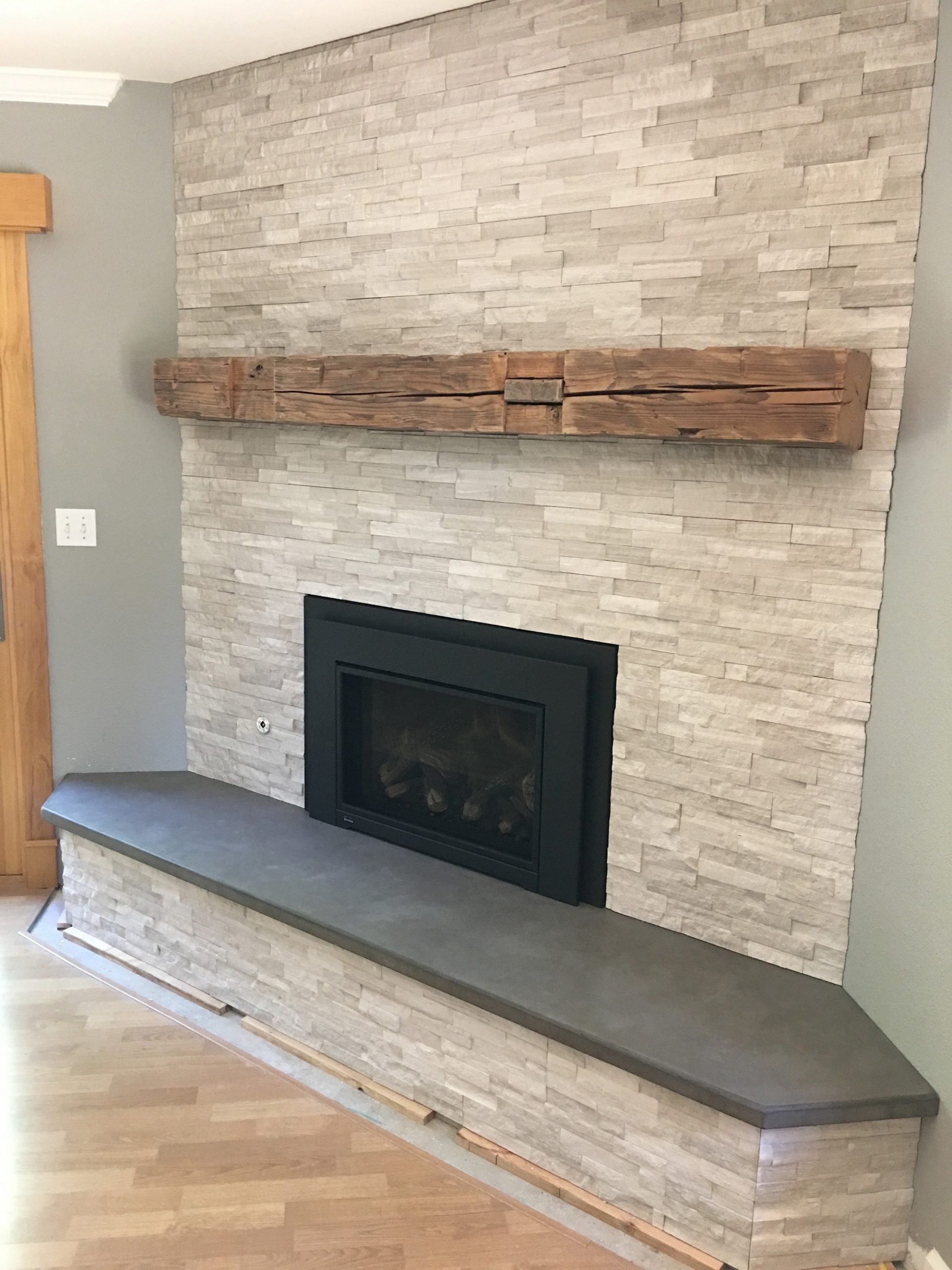 Black Concrete Hearth with Stone Fireplace 2