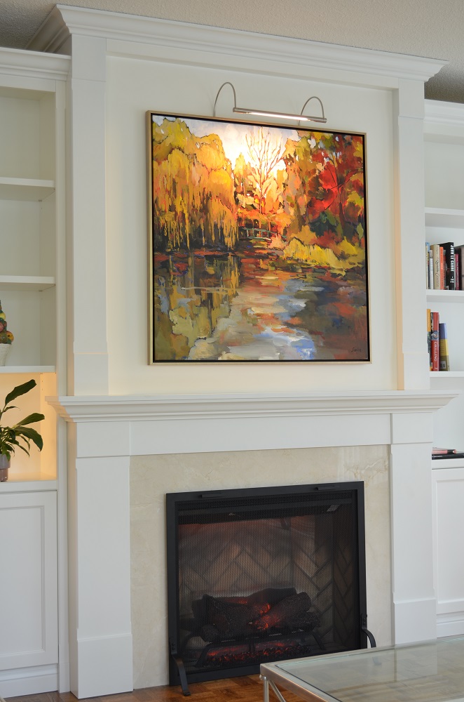 Accessorizing your fireplace with custom fireplace doors and Bloor West fireplace wall AFTER vertical 1000pix
