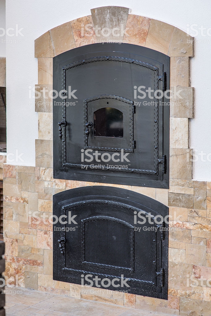 firebox door of a retro wood burning stove gm