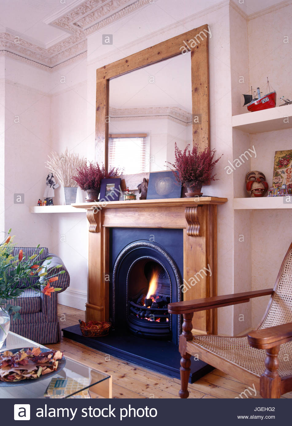 Fireplace Mirror Fresh Mirror Above Pine Fireplace with Fire Burning In Grate Stock