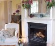 Fireplace Tray Fresh White Armchair Beside Fireplace with Lit Fire In Country