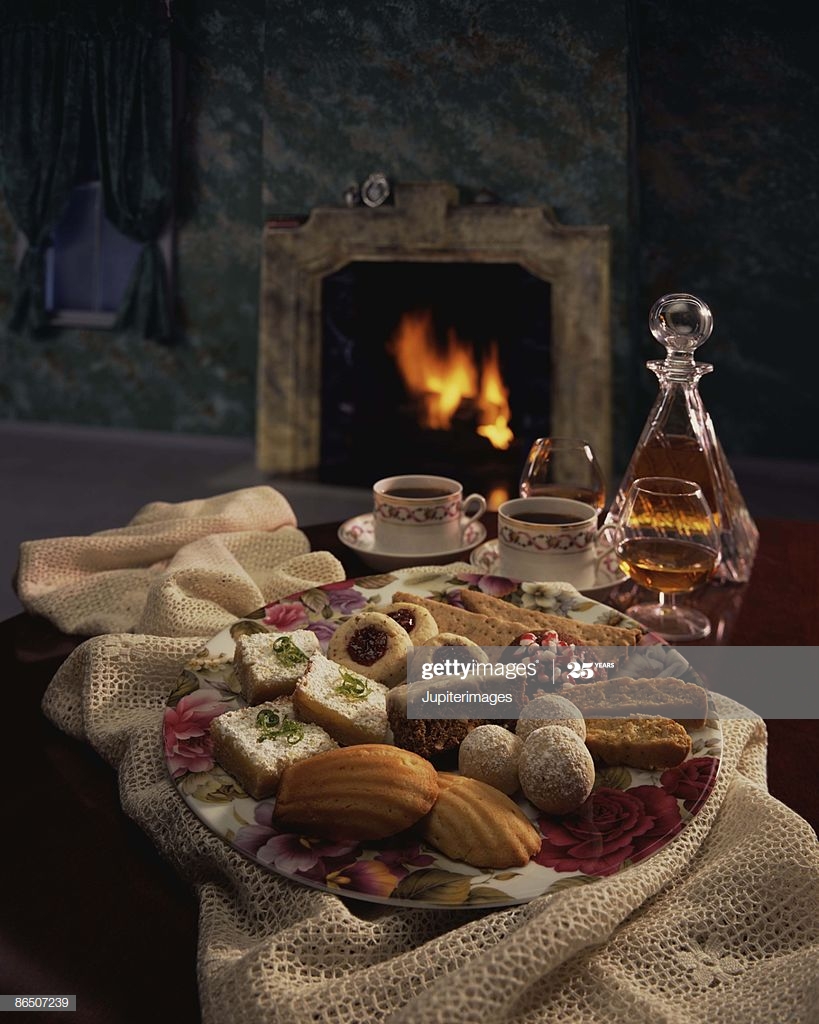 tray of cookies by fireplace picture id