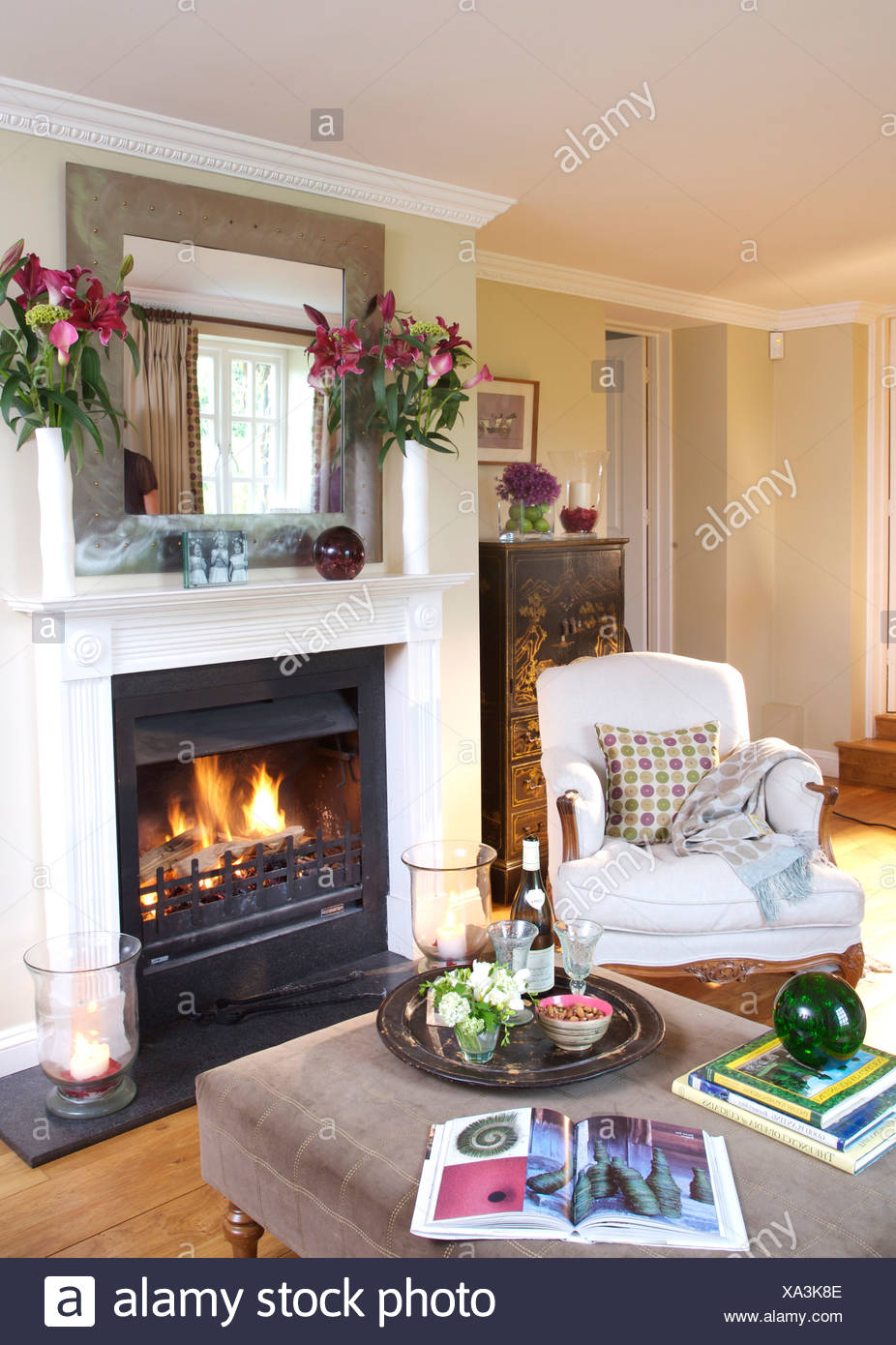 Fireplace Tray Unique White Armchair Beside Fireplace with Lit Fire In Country