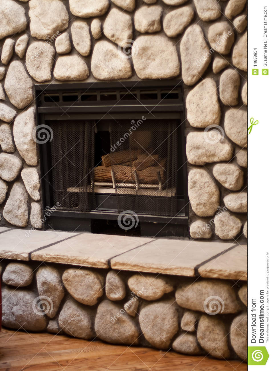 gas fireplace big rocks wall