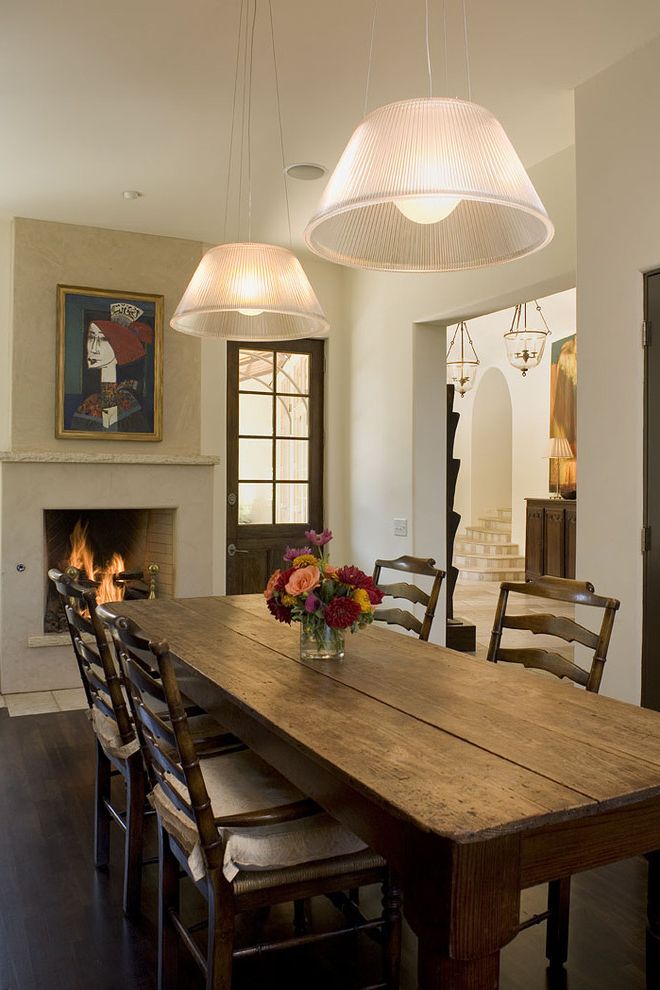 Farm Tables for Sale with Rustic Dining Room Also farm tables for sale with rustic dining room and centerpiece dark floor farmhouse table fireplace floral arrangement kitchen fireplace kitchen table ladderback chairs pendant lighting rustic shaker chairs wall art wall decor wood flooring