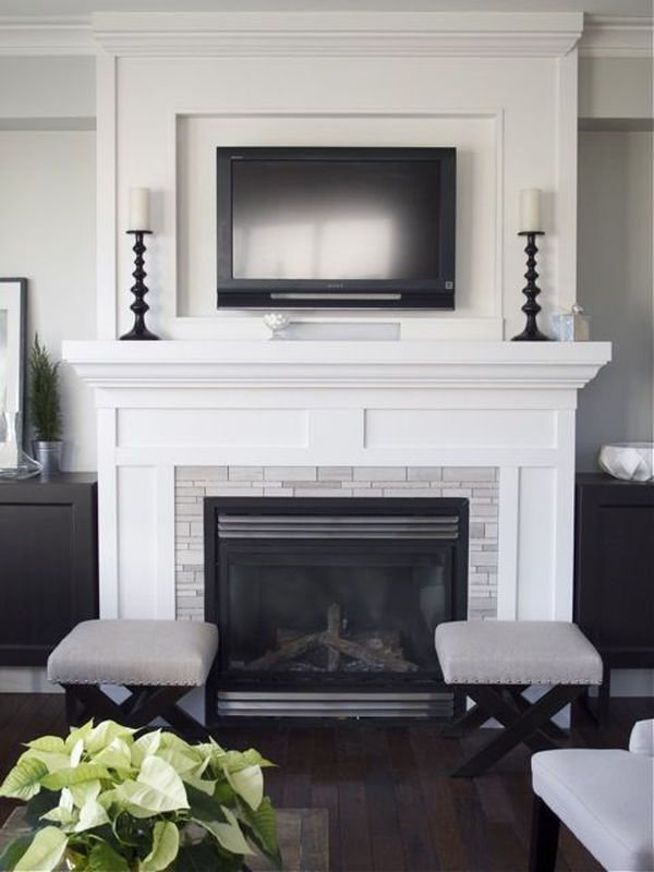 tv above fireplace white design